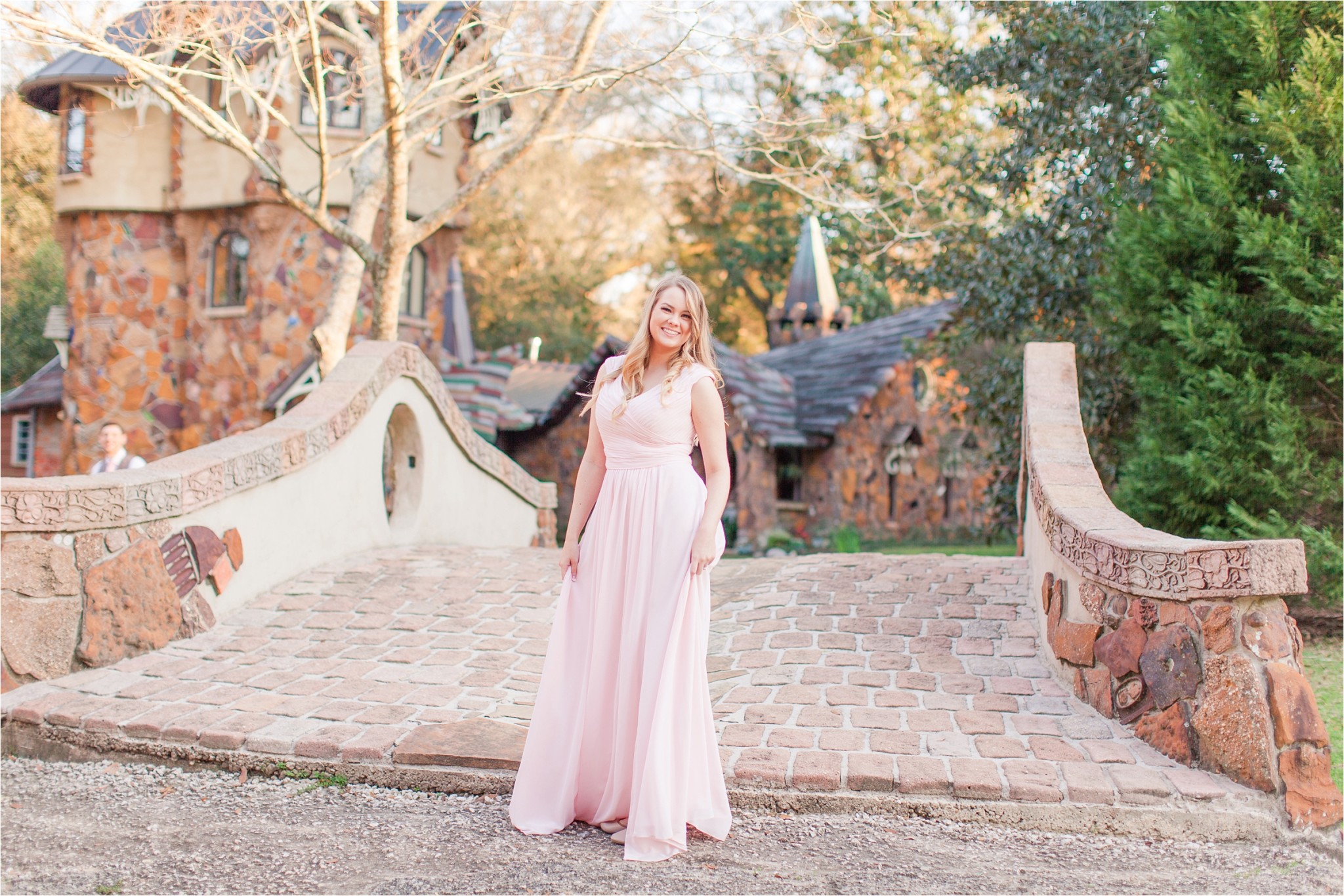 Kayla at the Dean Mosher Castle, twirling on the bridge