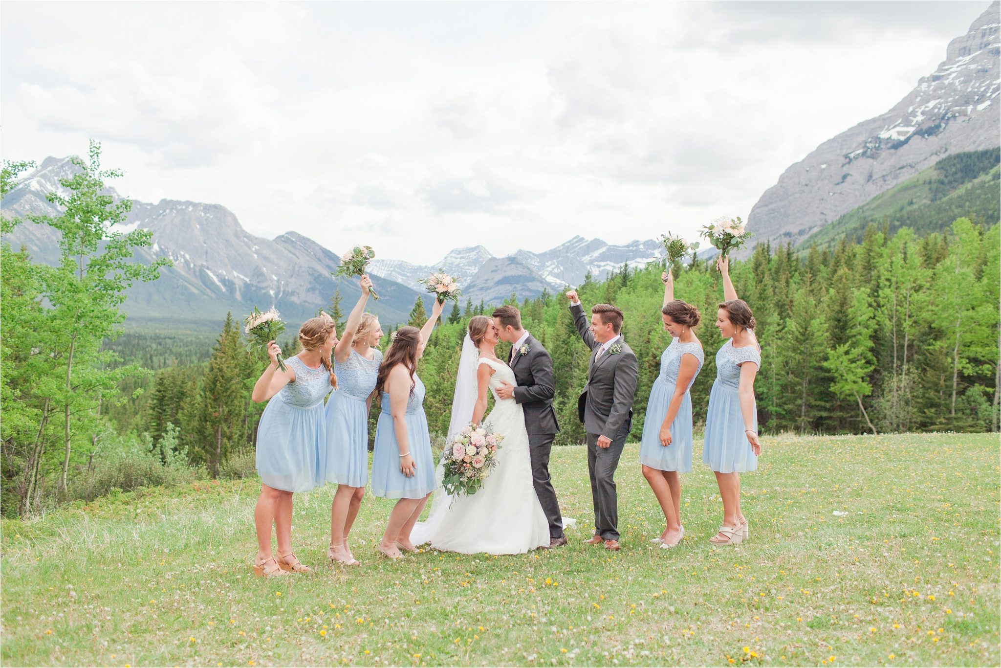 Kananaskis Canada Wedding at the Delta Lodge-Kaitlin & Ricky-Alabama wedding photographer-Lodge wedding-Bridal photography-Outside bridal shoot-Mountain wedding-Mountain wedding-Canada wedding photographer-Bride-Bride and bridesmaids-Blue bridesmaids dresses-Wedding floral-Bridal bouquet-Bride and groom