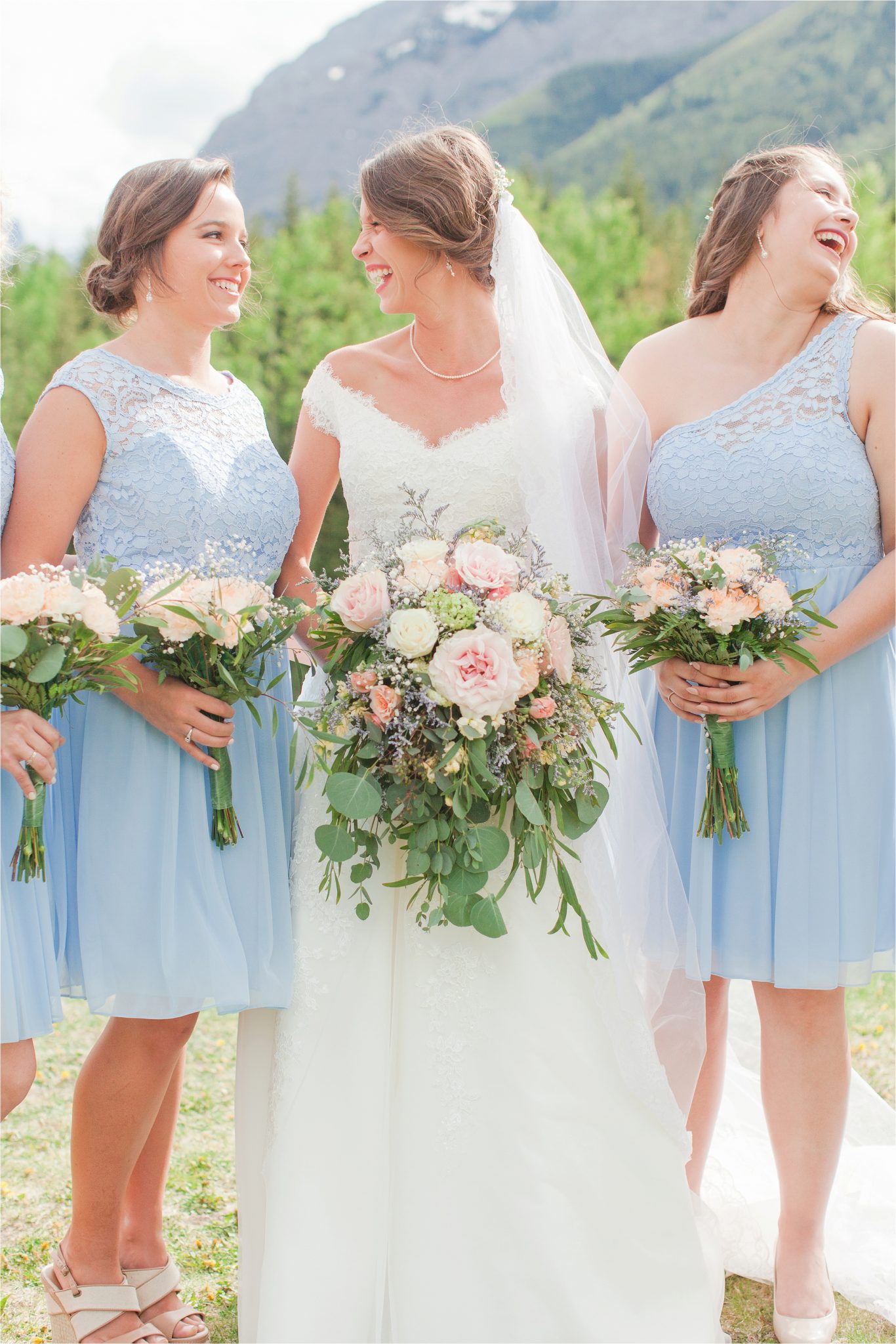 Kananaskis Canada Wedding at the Delta Lodge-Kaitlin & Ricky-Alabama wedding photographer-Lodge wedding-Bridal photography-Outside bridal shoot-Mountain wedding-Mountain wedding-Canada wedding photographer-Bride-Bride and bridesmaids-Blue bridesmaids dresses-Wedding floral-Bridal bouquet