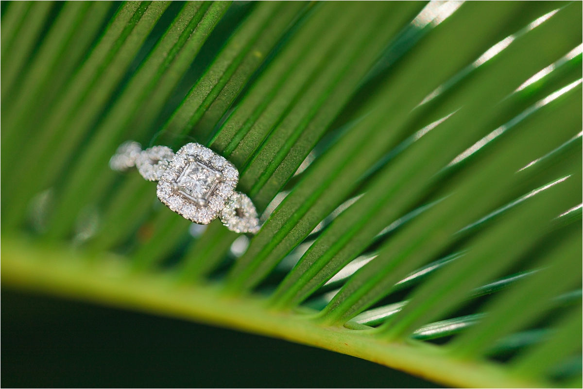 white-gold-engagement-ring-square-cut-diamond-halo-ornate-detail-band