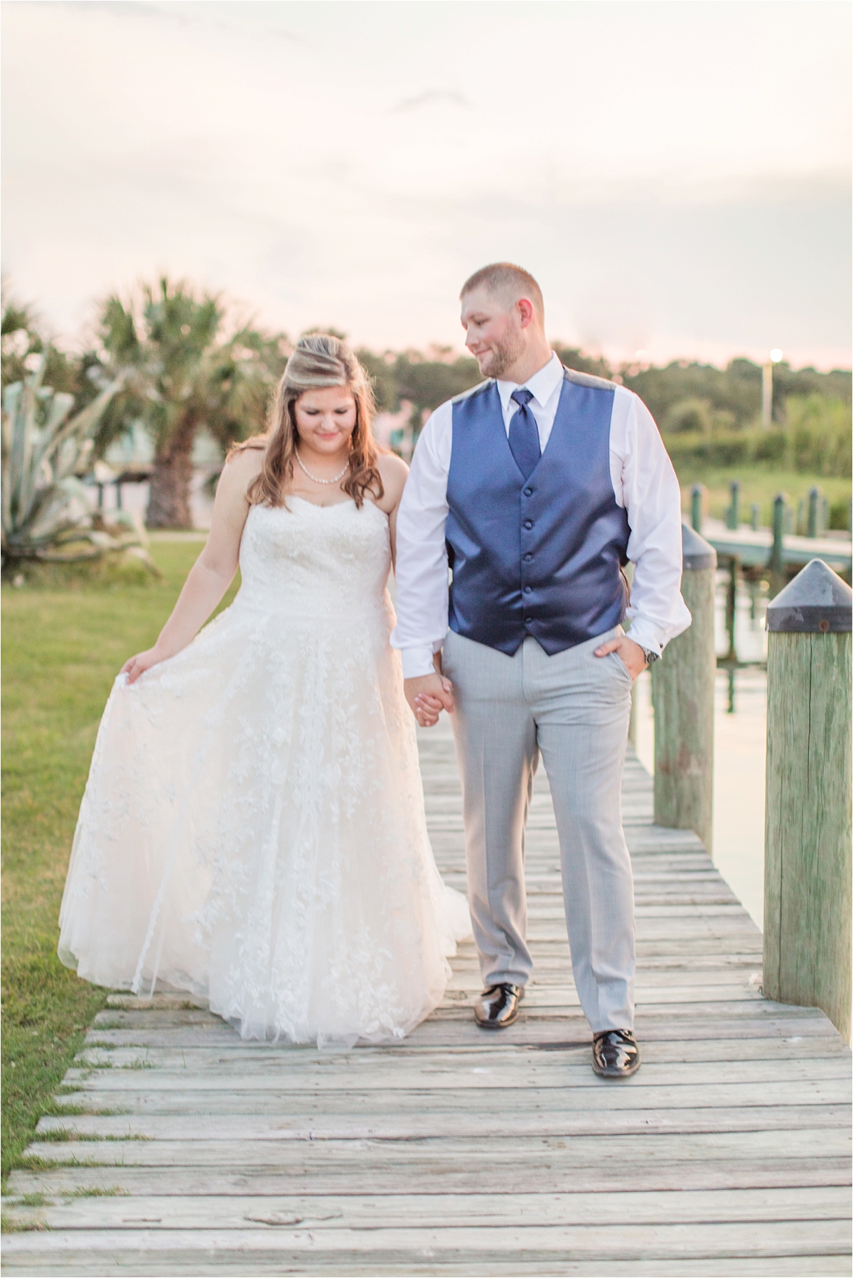 navy-venue-alabama-wedding-photographer-Dauphin Island Estuarium-on the beach-beach-bride-groom-portraits