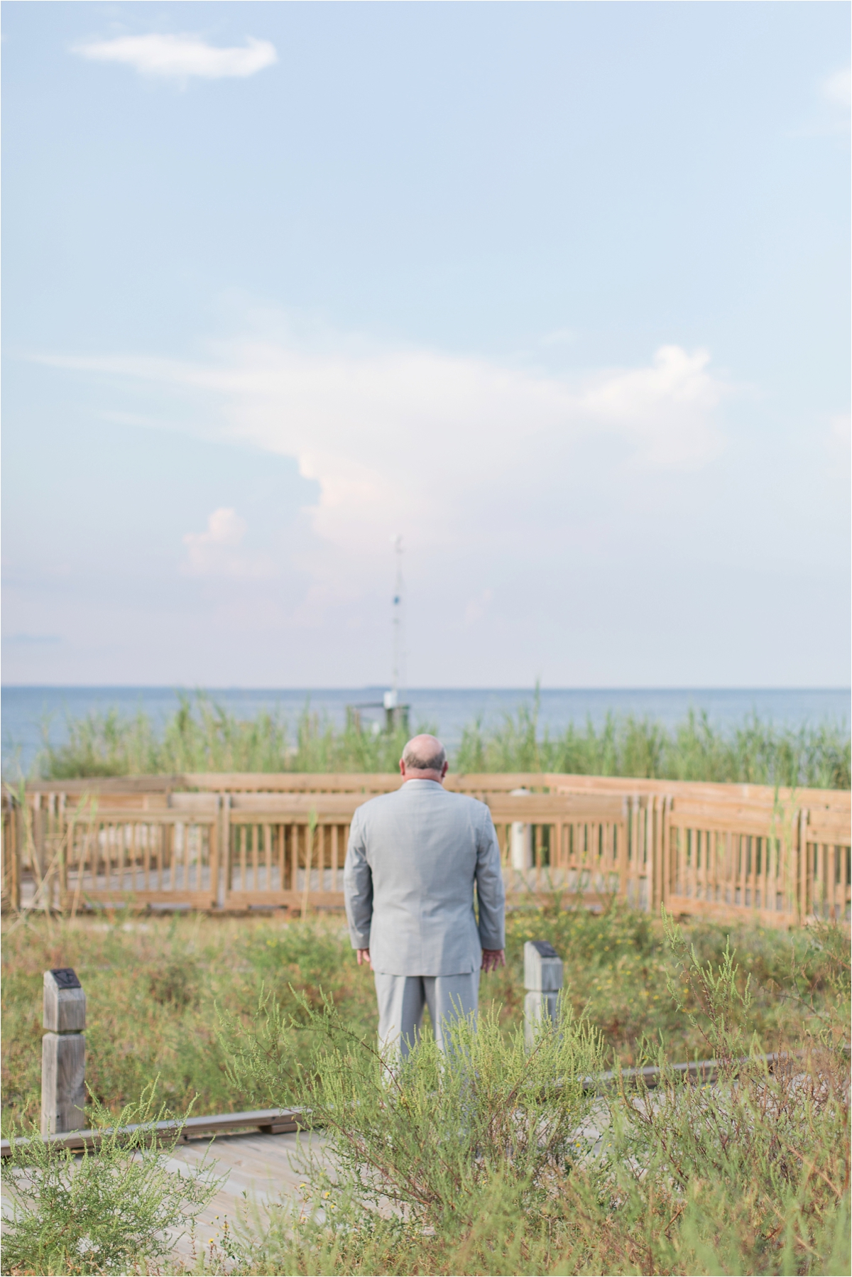 first look-father of the bride-alabama-wedding-photographer-Dauphin Island Estuarium-on the beach-beach