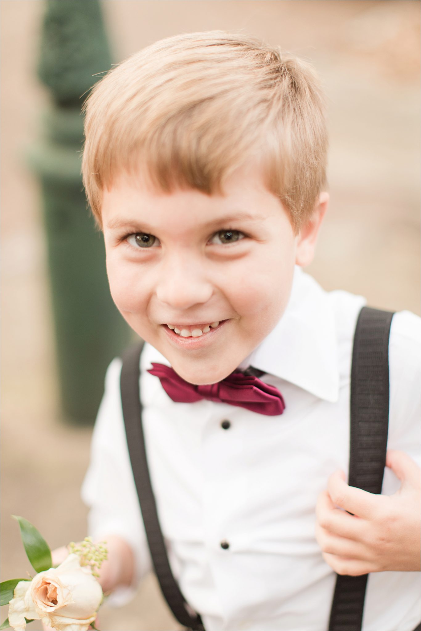 ring-bearer-maroon-bow-tie-suspenders-alabama-wedding-photographer