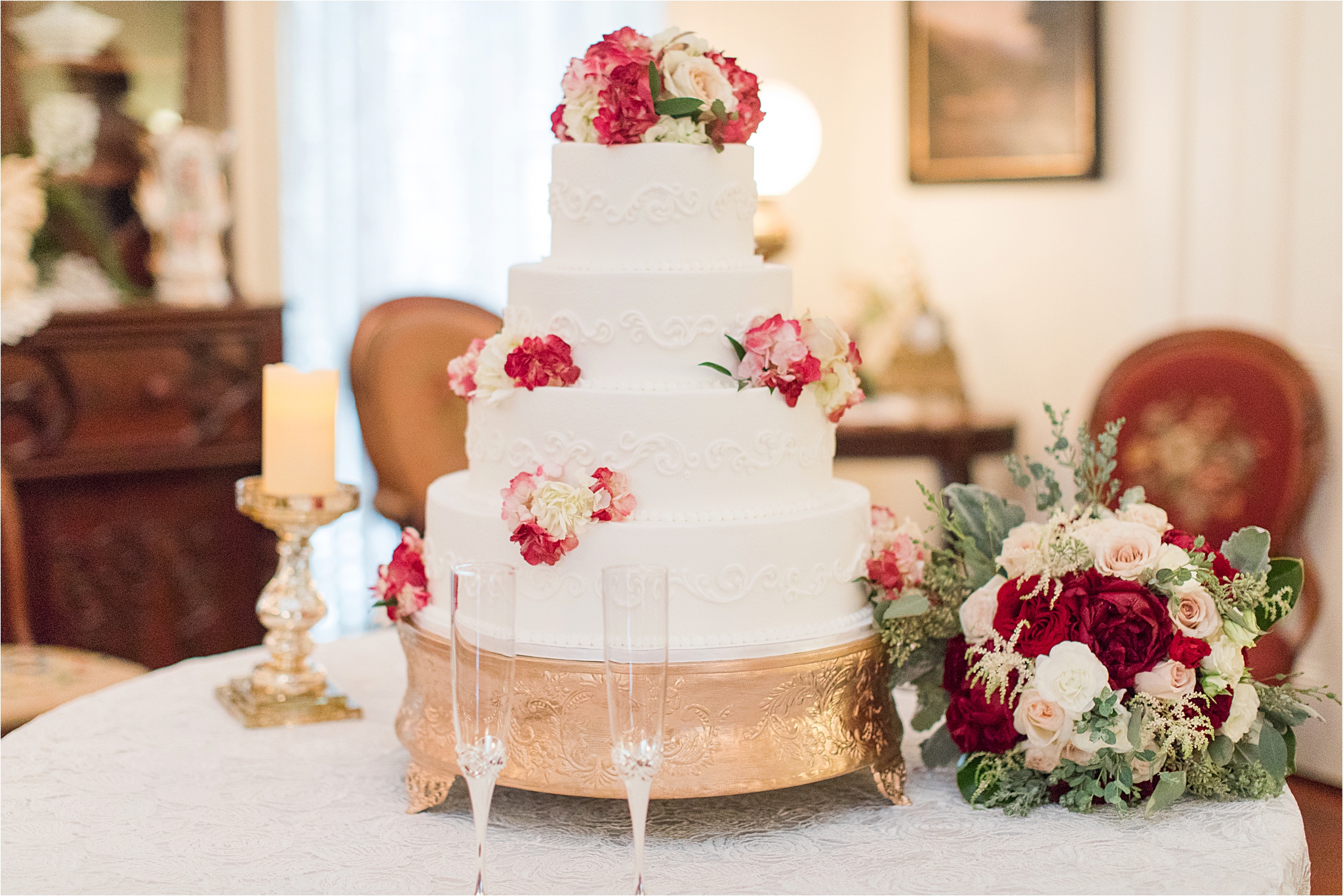 four-tier-wedding-cake-red-roses-bushle-flower-cake-topper