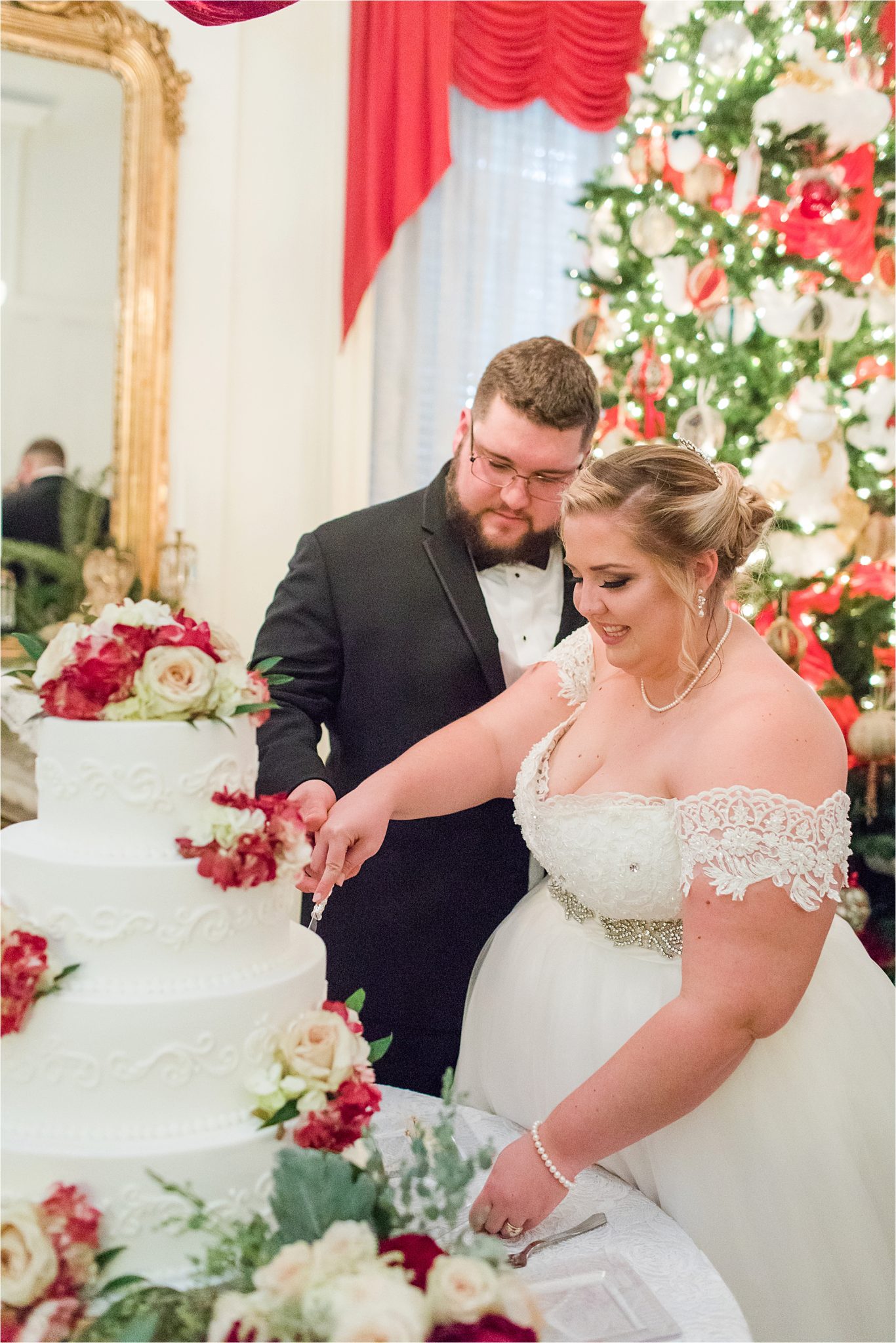 wedding-reception-christmas-winter-cake-cutting-bride and groom