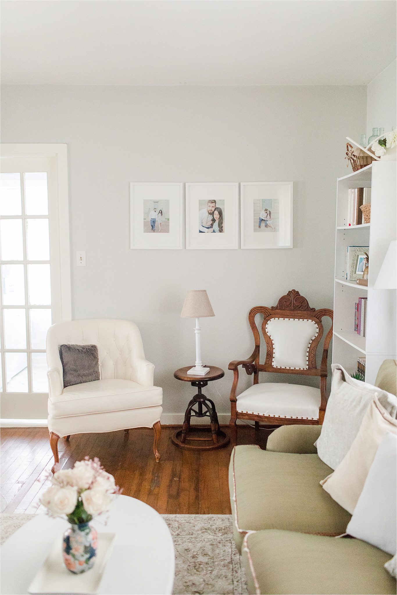 first-home-living-room-vintage-airy-neutrals-family-photos-chair