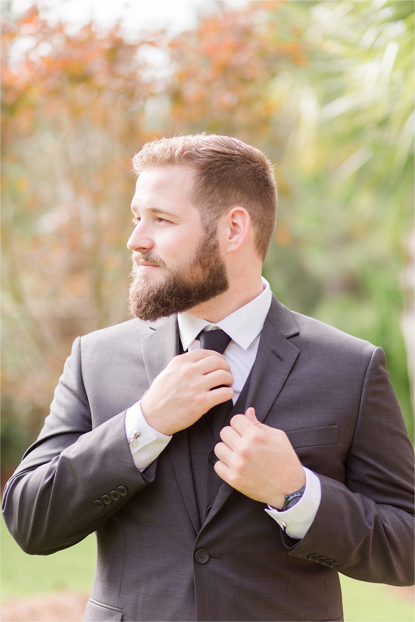 wedding day-groom-black tie-grey suit-beard-strong