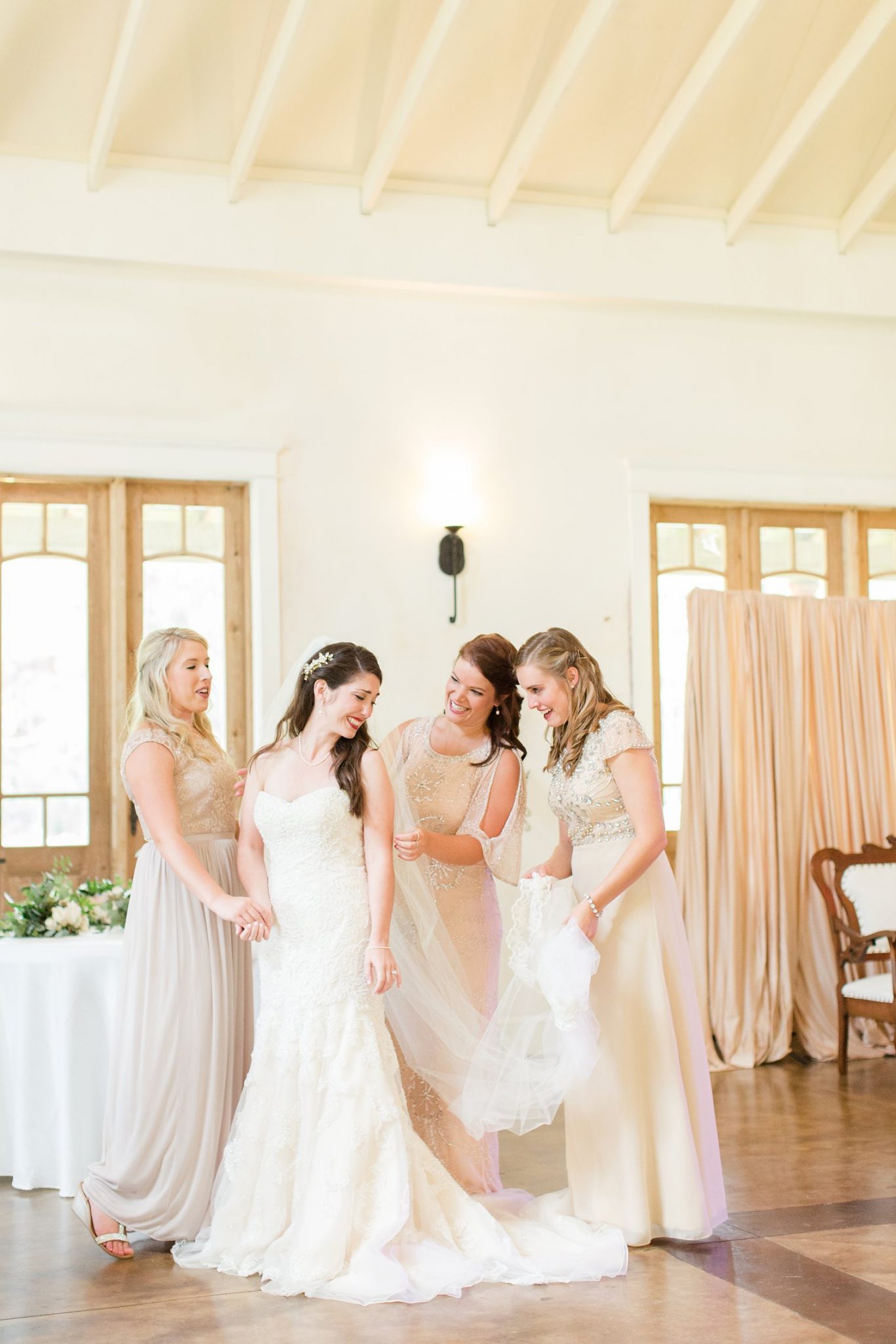 Bridesmaids-neutrals-champagnes-dresses-bride-brooch-hair-piece