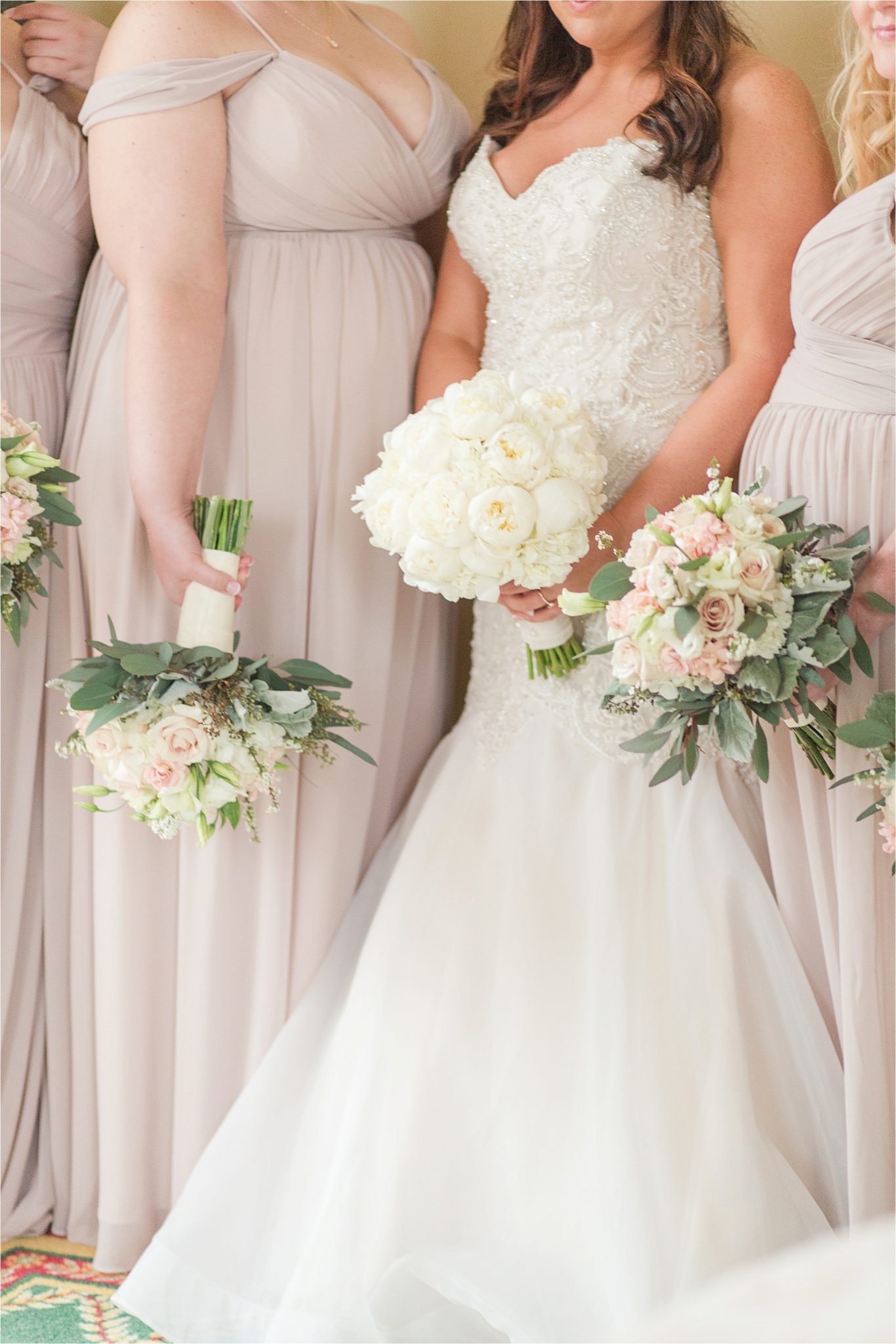 stunning lighting-bridal portraits-mermaid wedding dress-ezell house historic downtown-alabama wedding photographer-blush bridesmaid dresses-soft blushes-mermaid wedding dress-strapless bridal dress