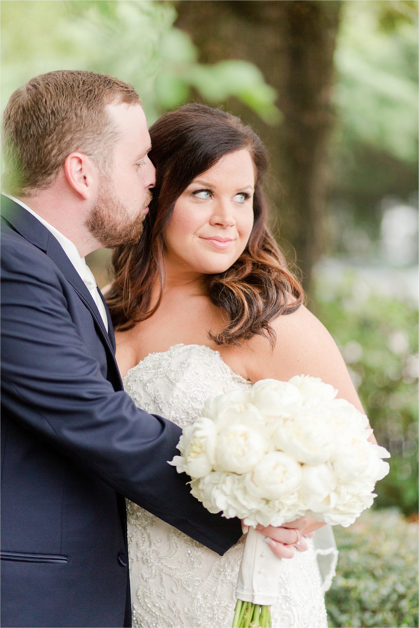 white rose bouquet-bride and groom-groom with beard-bride and groom portraits