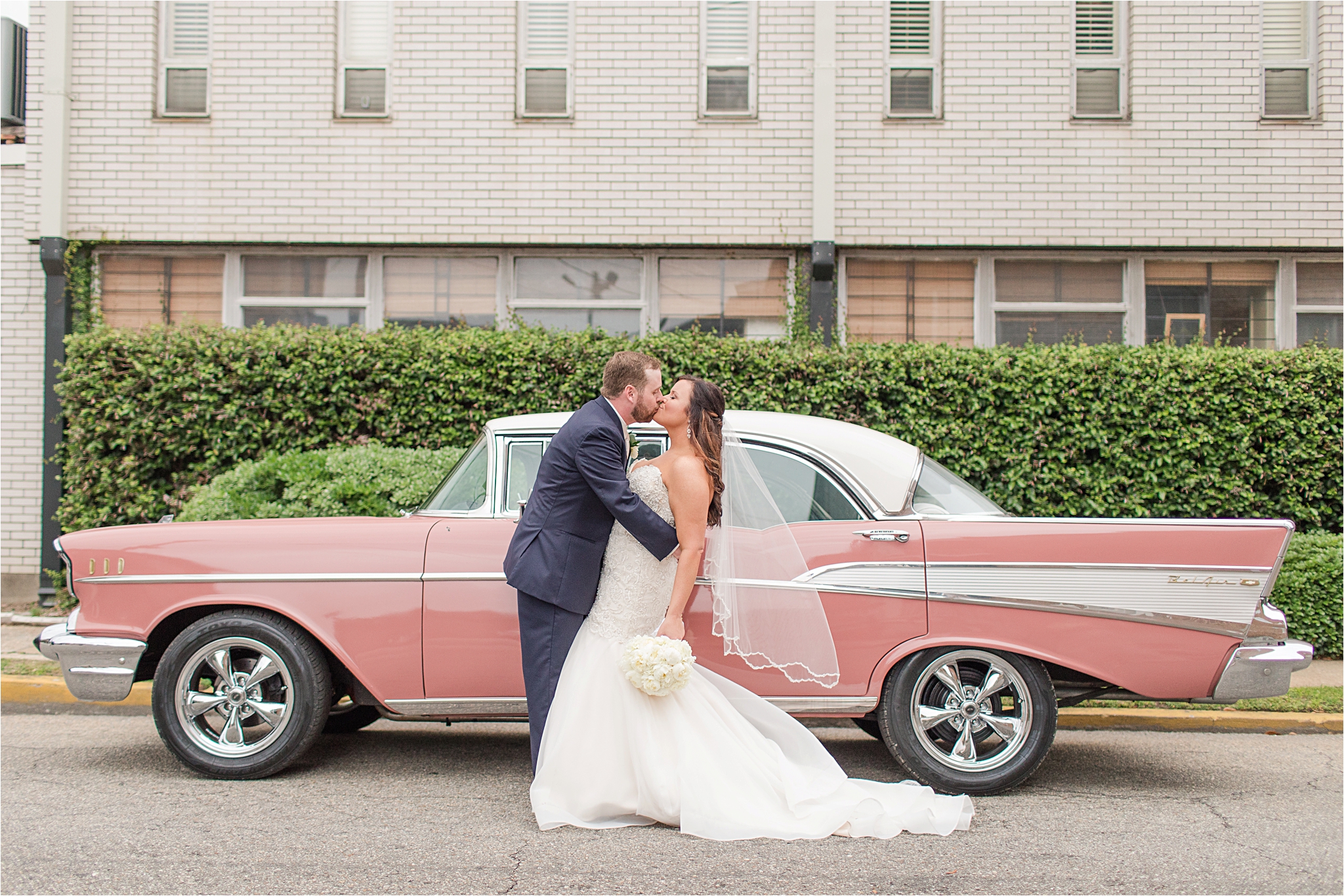 old fashion pink cadillac-just married-getaway car-mermaid cut dress-white rose bouquet-convertible cadillac-coral-pink-mauve-blush-terra cotta