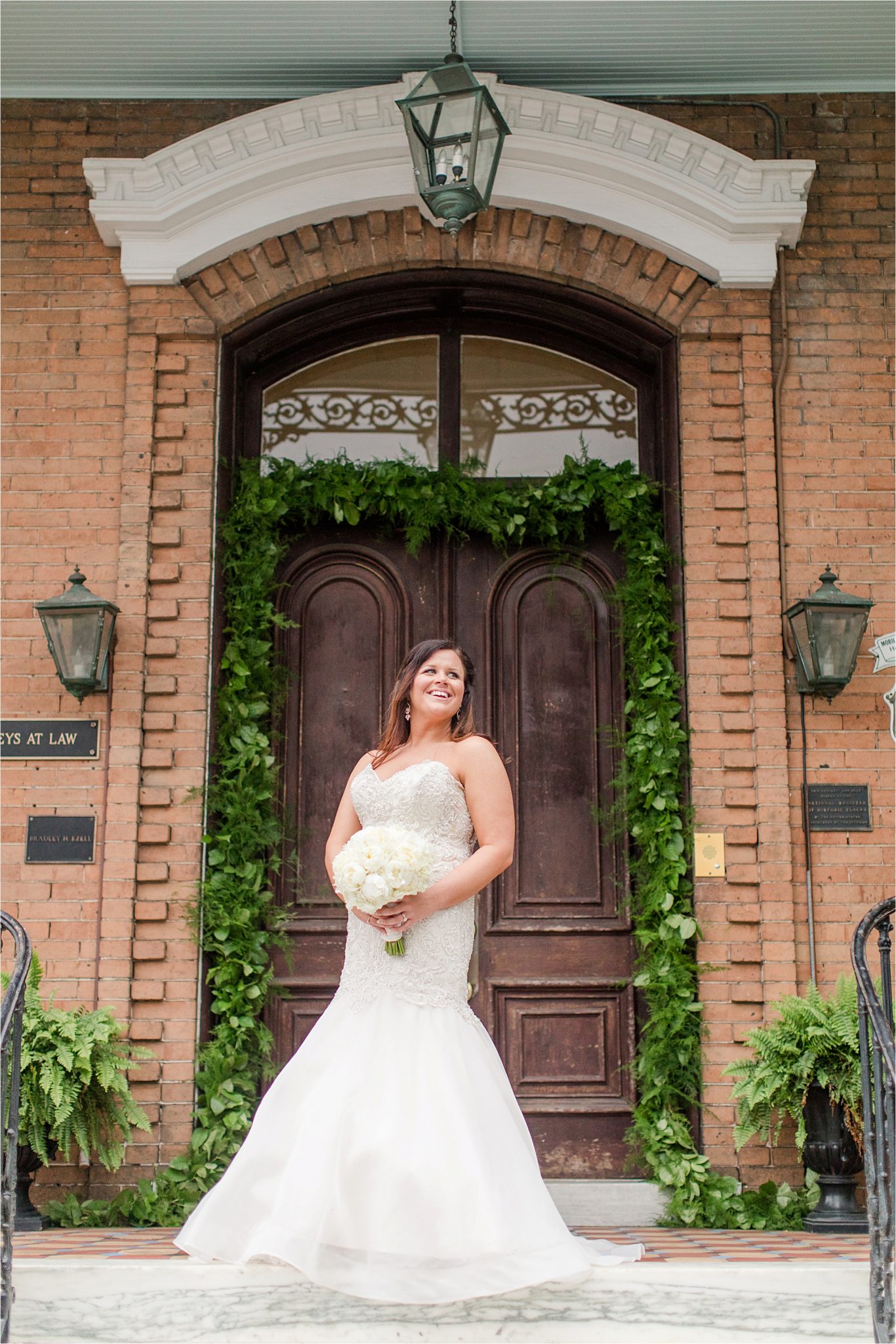 Mermaid wedding dress-bridal photos-brick background-ivy-frame