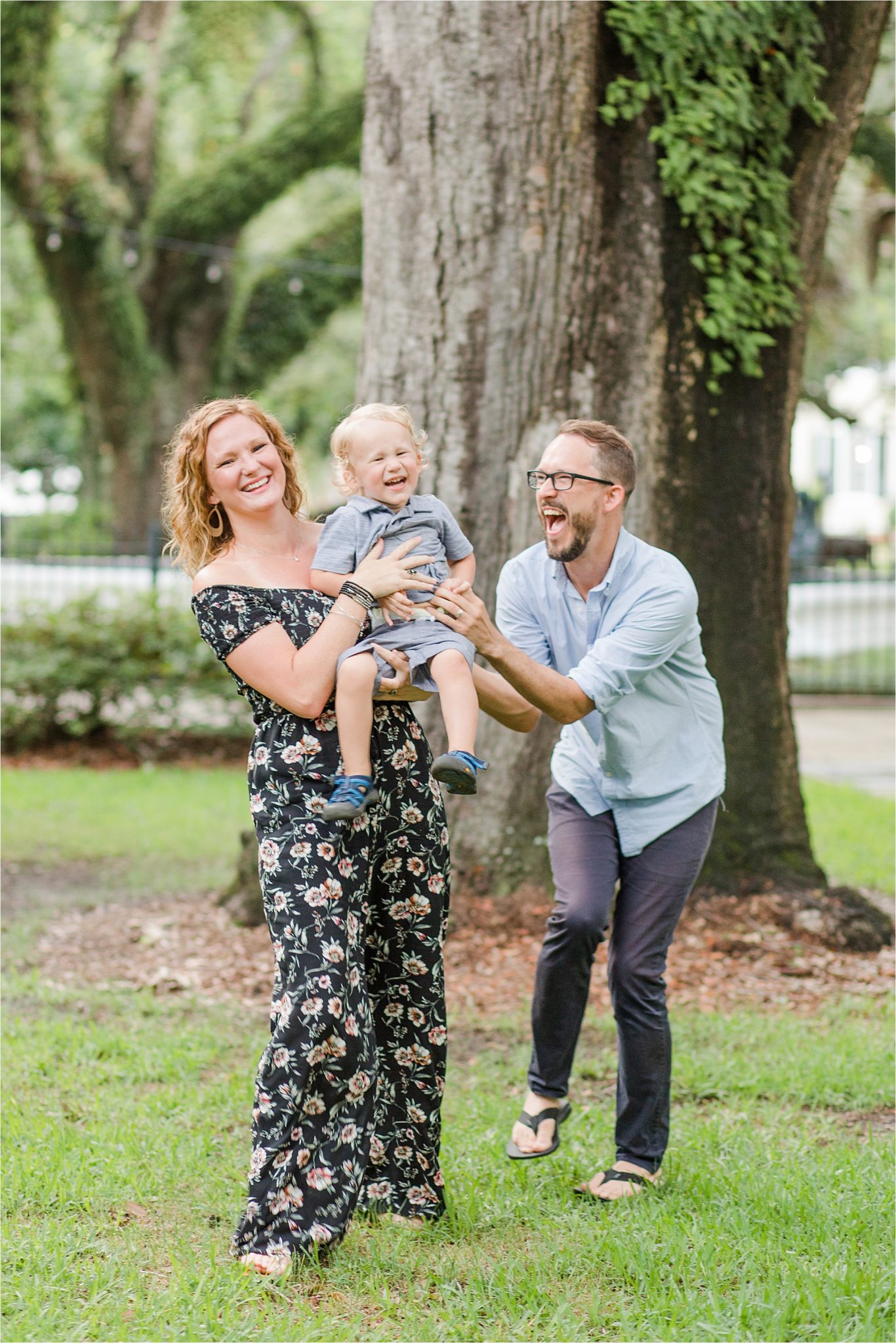 joyful family photos-Alabama Family Photography-mother father and son photos-family of three-candid family photography