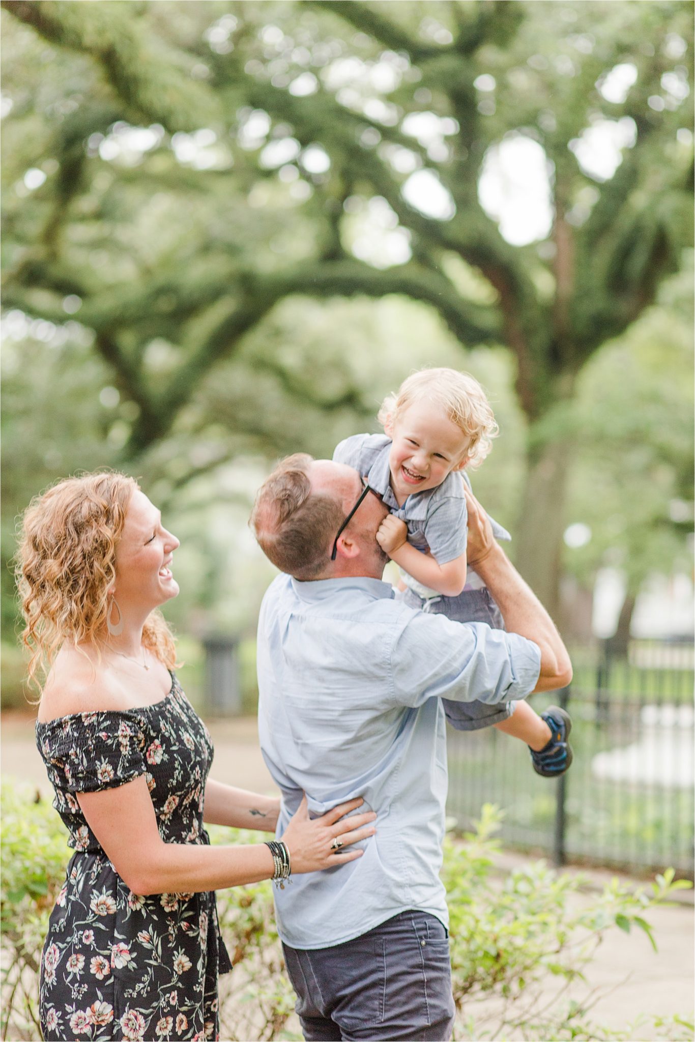 joyful family photos-Alabama Family Photography-mother father and son photos-family of three-candid family photography