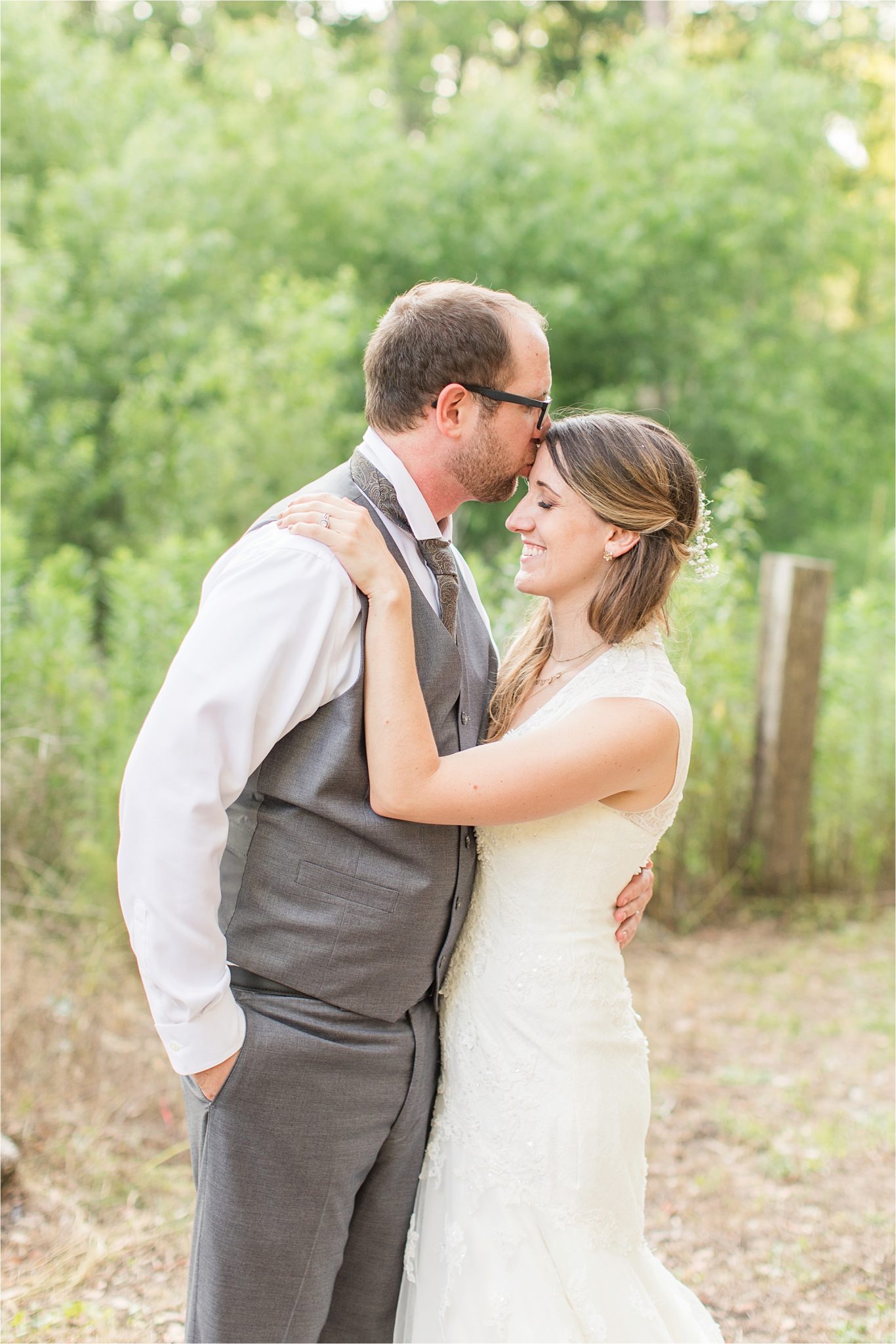 Precious bride and groom shots-photos-grey groomsmen suit-vest-bride and groom