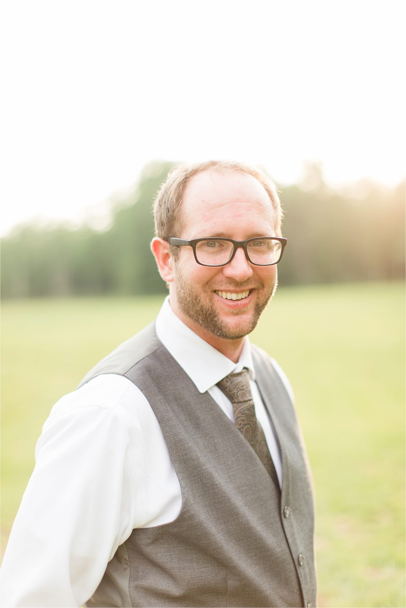 paisley tie-backyard country wedding-groom portraits-grey vest-white dress shirt