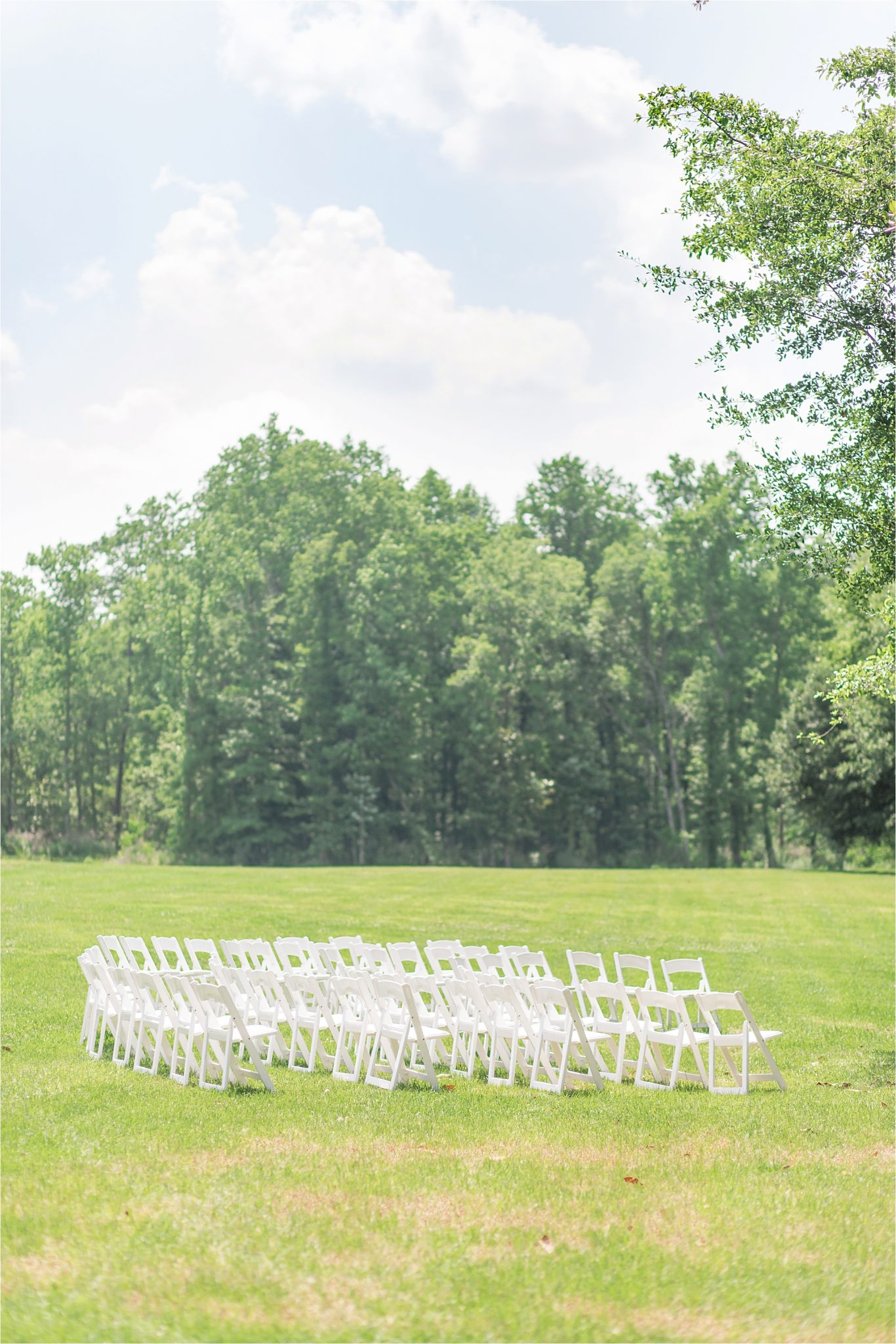 backyard-country-wedding-budget-white chairs-wedding chairs-open feild