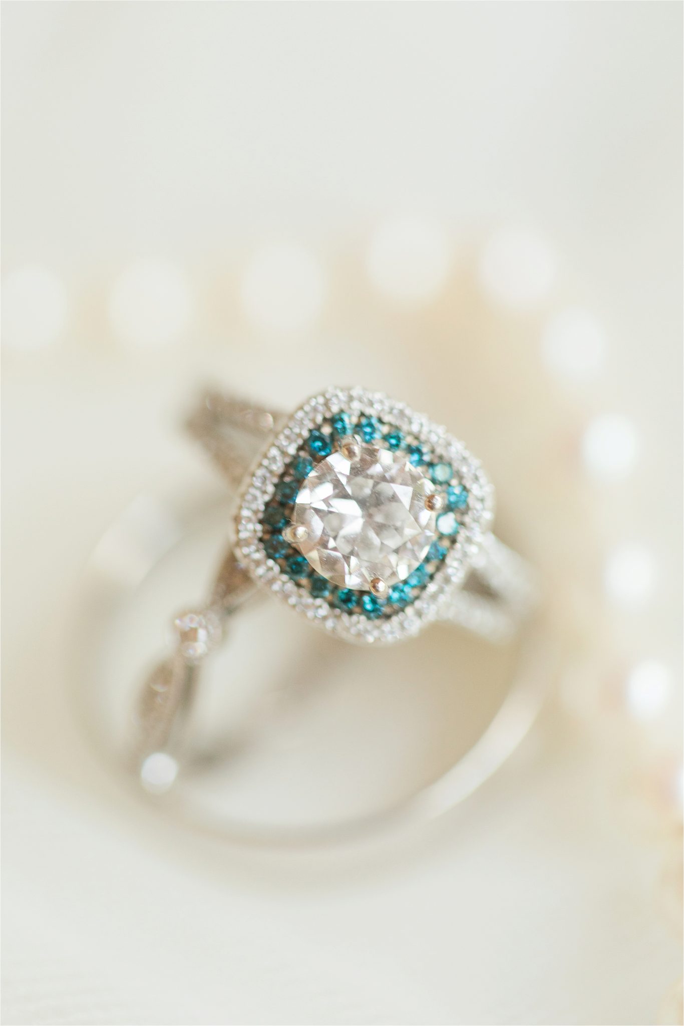 white gold-blue diamond-cushion cut-engagement ring-double halo-halo-double band-diamonds