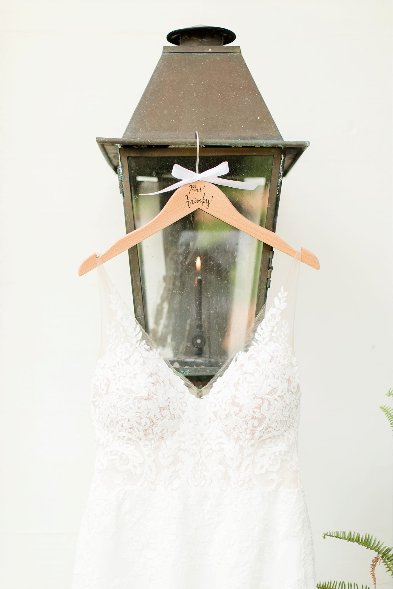 Hedge Farm Wedding-Alabama Wedding Photographer-Barn Wedding-Wedding Dress-lamp post-wedding hanger with Mrs. 
