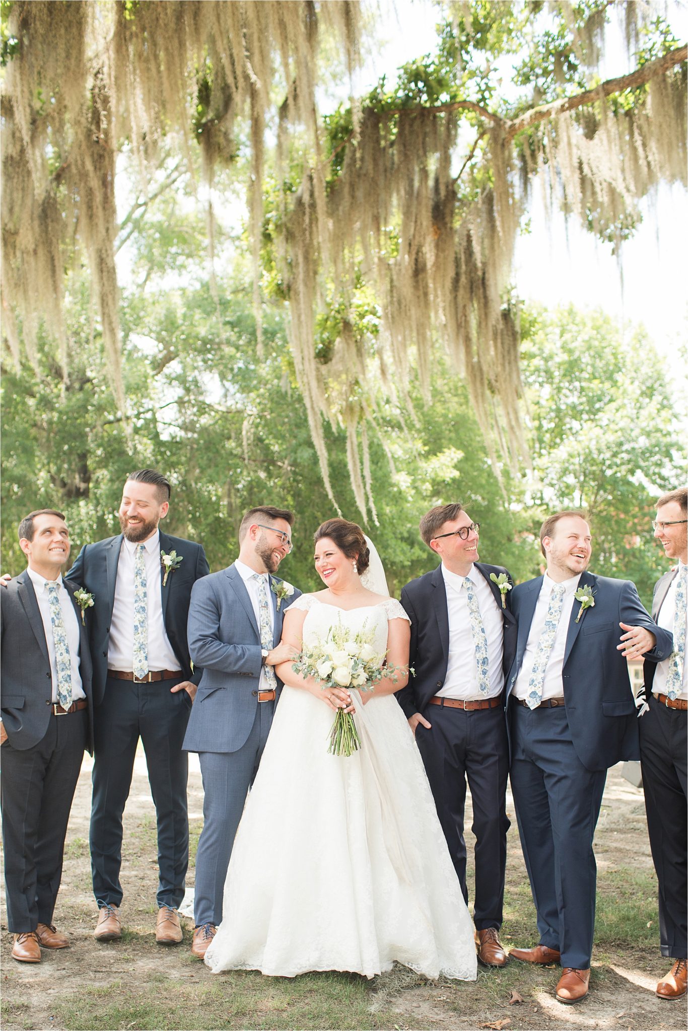 Pastel Themed Wedding-The Chapel at the Waters-Montgomery Alabama Photographer-Miles & Meredyth-Blue Themed Wedding-Navy Blue Groomsmen-Bride and groomsmen-Wedding Dress