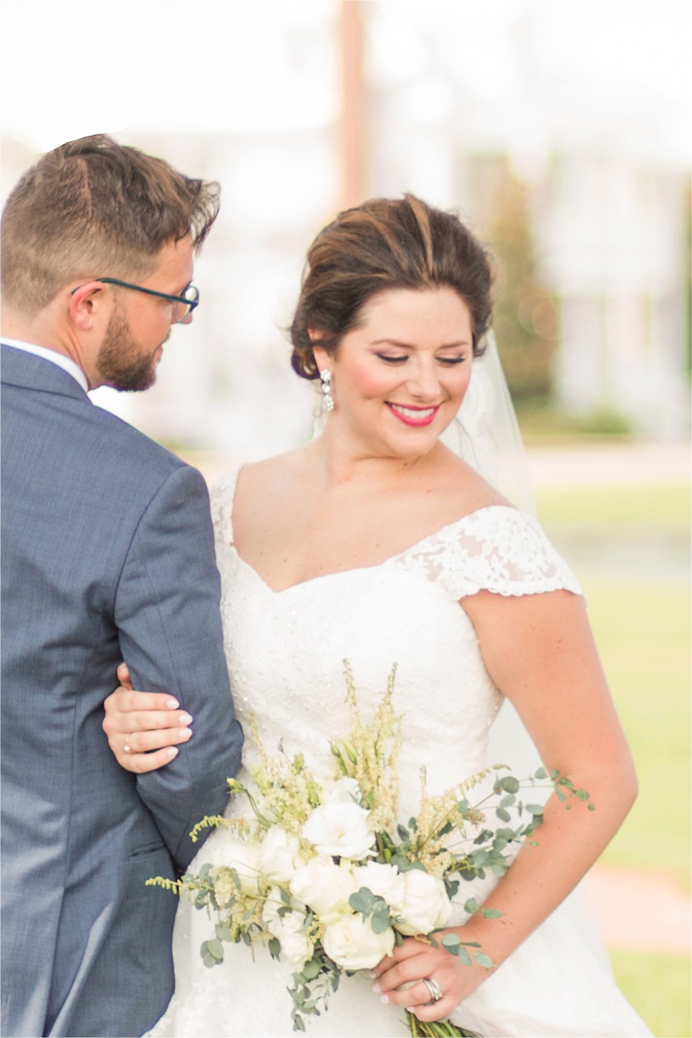 Pastel Themed Wedding-The Chapel at the Waters-Montgomery Alabama Photographer-Miles & Meredyth-Blue Themed Wedding-Navy Blue Groom Attire-Wedding Dress-Bride Bouquet