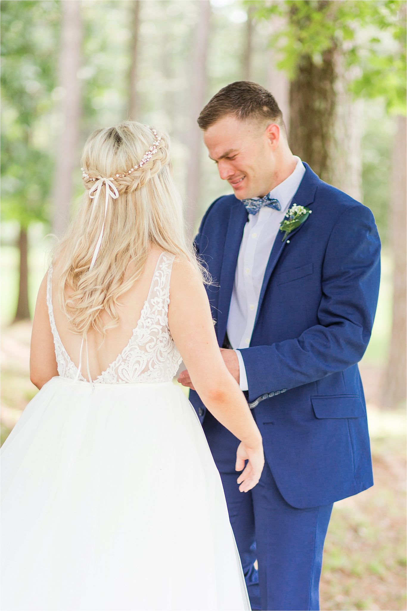 blue-suit-groom-bride-bow-tie-first-look