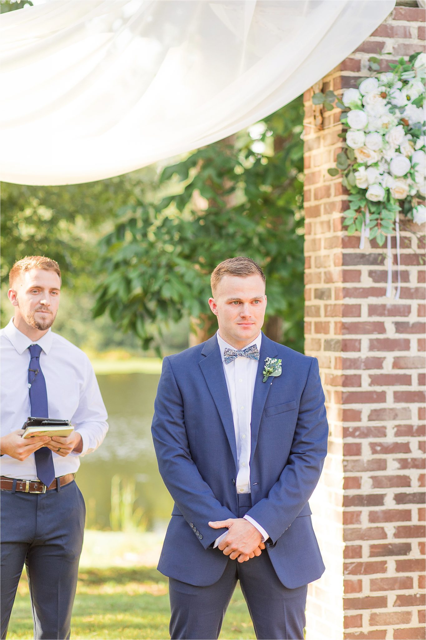 groom at the end of the aisle-blue-steel-wedding-color-first-look