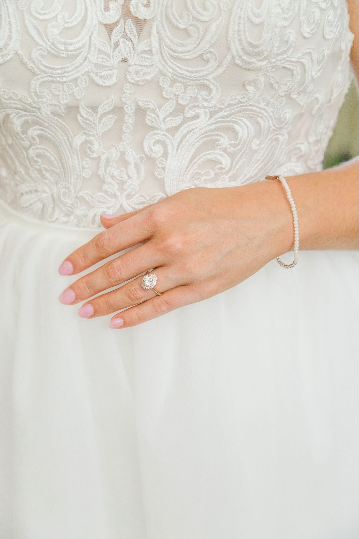 a-line-wedding-gown-lace-detail-unique-wedding-ring-pearls