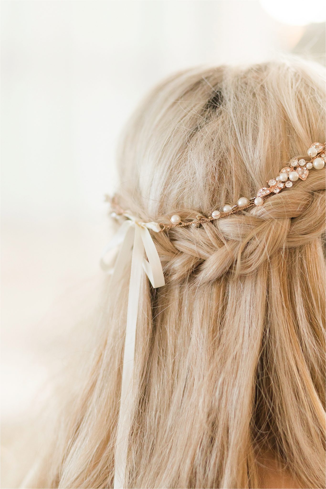 bridal-hair-braid-half-up-down-pearl-crown-bow-blonde-style-ivory