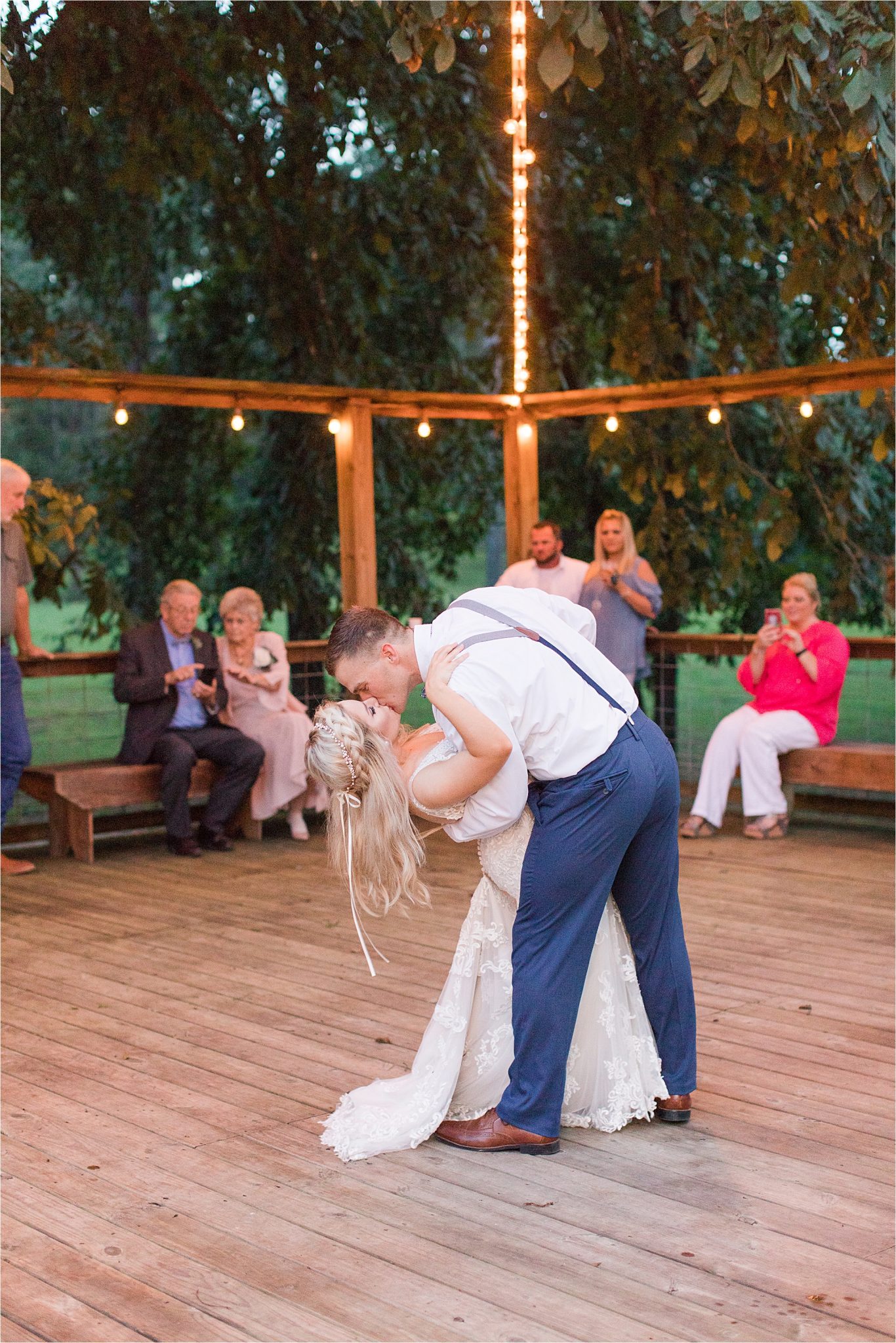 bride-groom-first-dance-dipping-kiss-wedding-reception-dance-floor