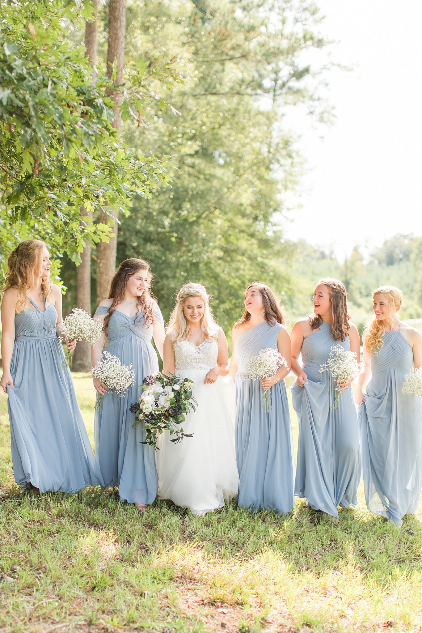 bride-bridesmaids-bouquets-periwinkle-long-dresses-different-cuts-styles
