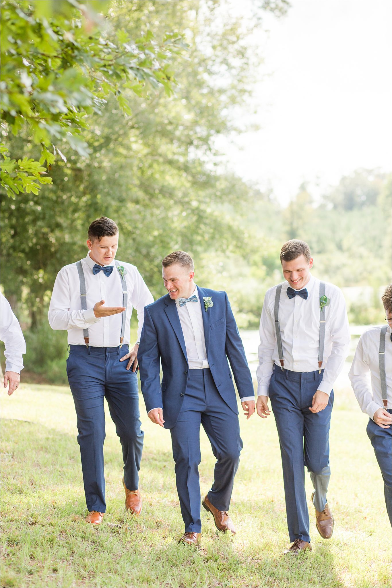 groom-groomsmen-blue-navy-bow-tie-suspenders-brown-shoes